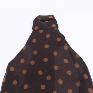 Brown polka dot print chiffon halter top with orange spots and high neckline design