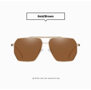 Close-up of golden metal frame polarized sunglasses with brown lenses and double bridge