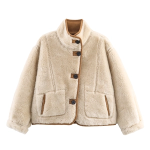 Fashionable off-white reversible fleece jacket with brown leather trim and black buttons