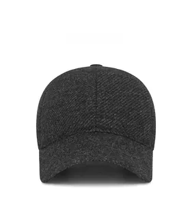 Detail of grey wool baseball cap showing twill texture and metal letter C logo