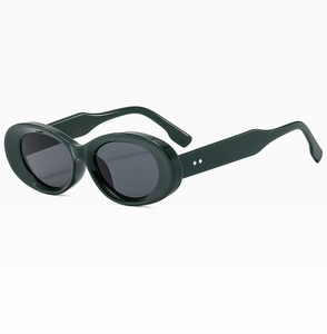 Detail view of oval dark green sunglasses with silver diamond rivets on wide temples