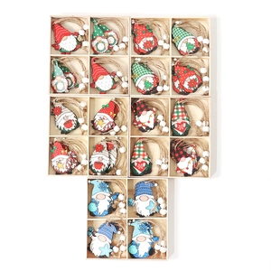Christmas wooden gnome ornaments set with colorful plaid designs and white beads