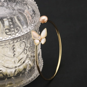 Elegant gold butterfly opening bracelet with pink pearl and mother-of-pearl zircon design