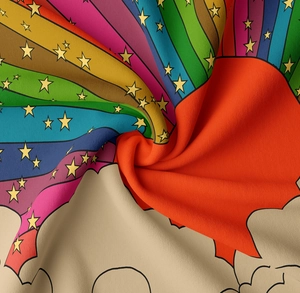 Macro shot of boho rainbow tapestry fabric with vibrant sun and stars printed on cotton
