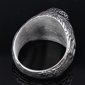 Punk style stainless steel skull ring with vintage relief textures and polished finish