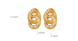 Detailed view of 18K gold plated double hoop earrings with crystal inlay and twist texture