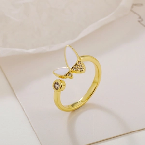Adjustable open butterfly ring with white enamel wing and micro zircon stones in gold finish