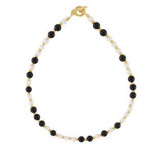 Luxurious onyx and shell beaded necklace with gold OT toggle clasp on a white background
