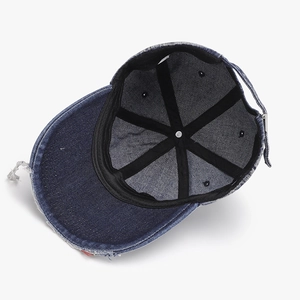 Distressed dark blue denim baseball cap with frayed edges and adjustable strap back