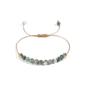Bohemian adjustable woven bracelet with natural stone beads and gold metal accents