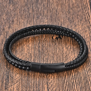 Multi-layer black leather bracelet for men with woven cords and magnetic metal clasp