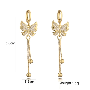 Close-up of 18K gold-plated butterfly tassel earrings with size and weight details