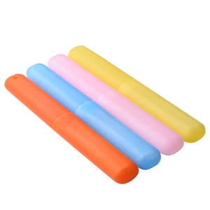 Set of four colorful portable travel toothbrush cases in orange blue pink and yellow