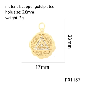 Macro view of gold-plated evil eye pendant with dimensions 23mm by 17mm for DIY jewelry