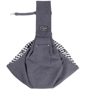 Detail view of grey pet sling with safety buckle and adjustable wide shoulder strap
