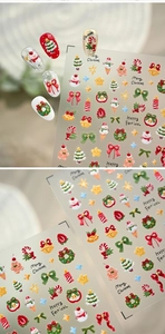 Detailed 5D embossed Christmas nail stickers featuring 3D bows and festive patterns