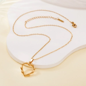 Retro golden bamboo heart pendant necklace in stainless steel with adjustable lobster clasp