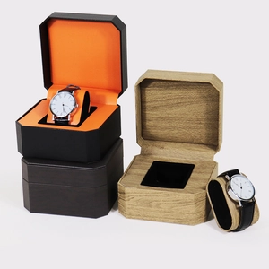 Octagonal PU leather watch boxes in wood grain and black finishes with soft pillows