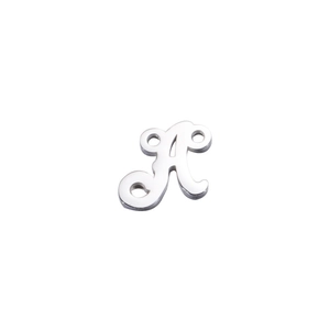 Close-up of a silver mirror-finish stainless steel letter A pendant with multiple holes