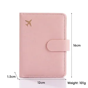 Pink PU leather RFID passport holder with gold airplane icon, size 16x12x1.5cm, 101g weight