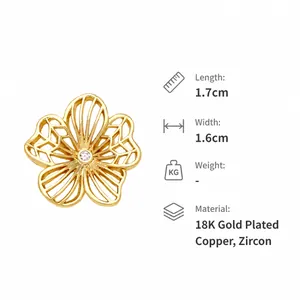 Detail of 18K gold plated copper flower pendant with dimensions 1.7cm by 1.6cm