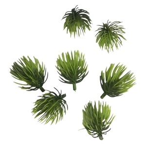 Artificial green pine needle sprigs for DIY Christmas crafts and greenery decorations