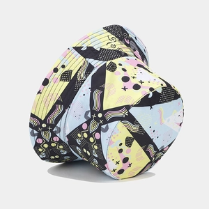 Detail of Memphis style abstract geometric pattern on a stylish cotton bucket hat