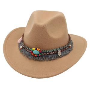 Western tan felt cowboy hat featuring turquoise stone and bohemian tassel band