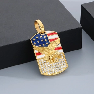 Detail of hip hop gold dog tag pendant with eagle relief and American flag crystal design