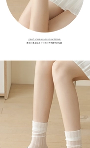 Detailed texture of breathable vertical ribbed cream white summer mesh crew socks