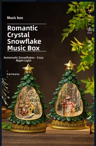 Detailed Christmas tree music box with automatic snow, warm lights and Santa reindeer scenery