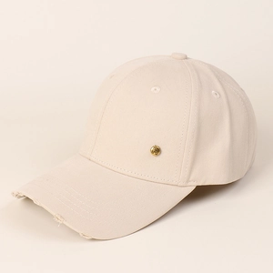 Detail of beige cotton baseball cap with distressed brim and golden metal H-buckle accent