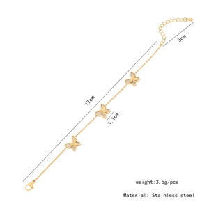 Détail du pendentif papillon 1,1cm avec ailes trèfle et incrustation nacre blanche