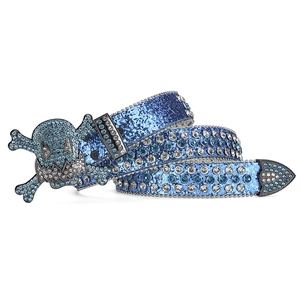 Close-up of blue glitter belt featuring a skull buckle with sparkling rhinestones and studs