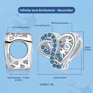 Detailed macro view of S925 sterling silver heart bead with MOM engraving and blue stones