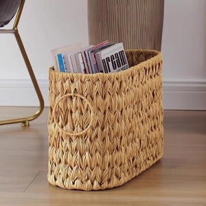 Handwoven rattan storage basket for magazines and tissues in natural wood finish
