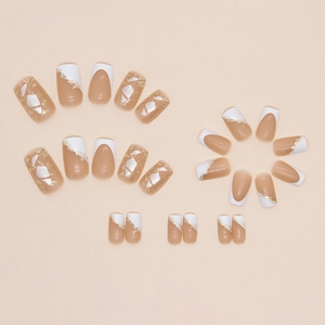 French tip press-on nails with gold foil and white square design in soft pink