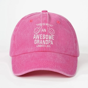 Close-up of white embroidery on pink washed cotton baseball cap for grandfathers