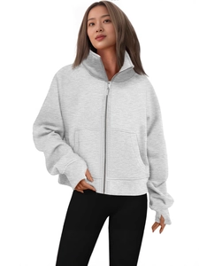 Light gray zip-up hoodie with thumbholes and front pockets for a sporty minimalist look