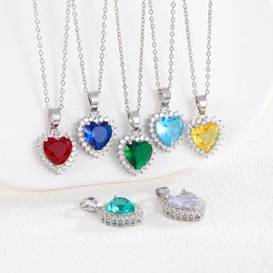 Elegant heart pendant necklaces with colorful gemstones and sparkling crystal border