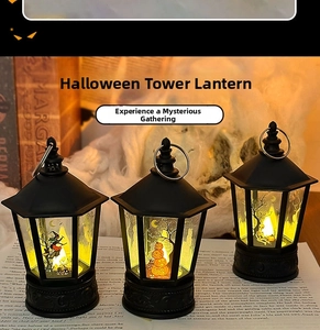 Three Halloween LED lanterns with witch and skull silhouettes on vintage book pages