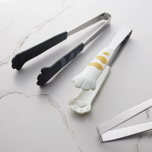 Cute cat paw food tongs with stainless steel handles for salad and snacks on marble