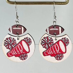 Detail of wooden cheer earrings with brown football and red megaphone printing