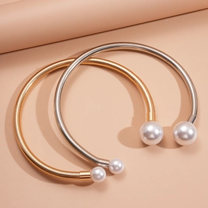 Minimalist geometric gold and silver open chokers with large faux pearls on metal snake chains