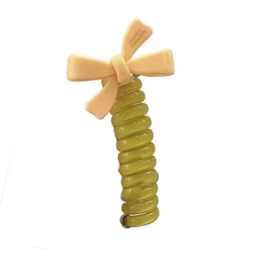 Spiral telephone wire hair tie with beige bow knot in yellow and cream colors