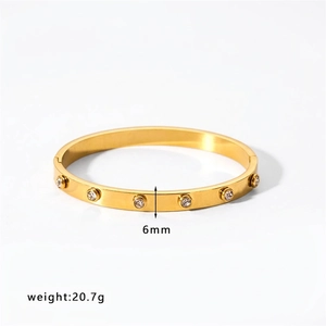 Polished 18k gold plated 6mm stainless steel bangle with inlaid sparkling crystals