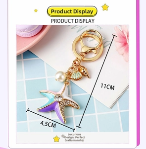 Detail of 11cm starfish keychain with colorful enamel, faux pearls and crystals