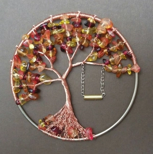 Handcrafted copper wire Tree of Life with amber stones and a small metal swing detail