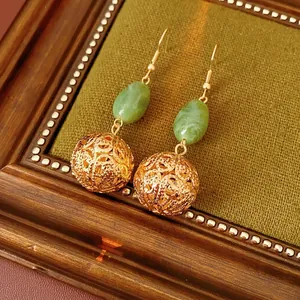 Vintage resin hollow pendant earrings with gold hooks and green marble beads