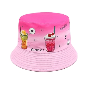 Detail of pink gradient sun hat featuring embroidered Sweety text and fruit patterns